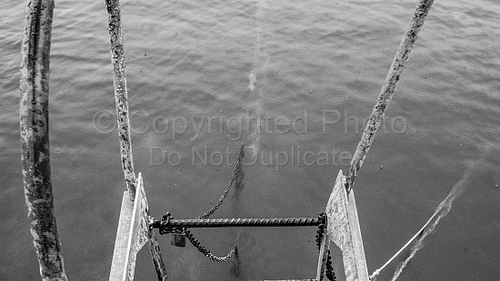 A ladder by the water